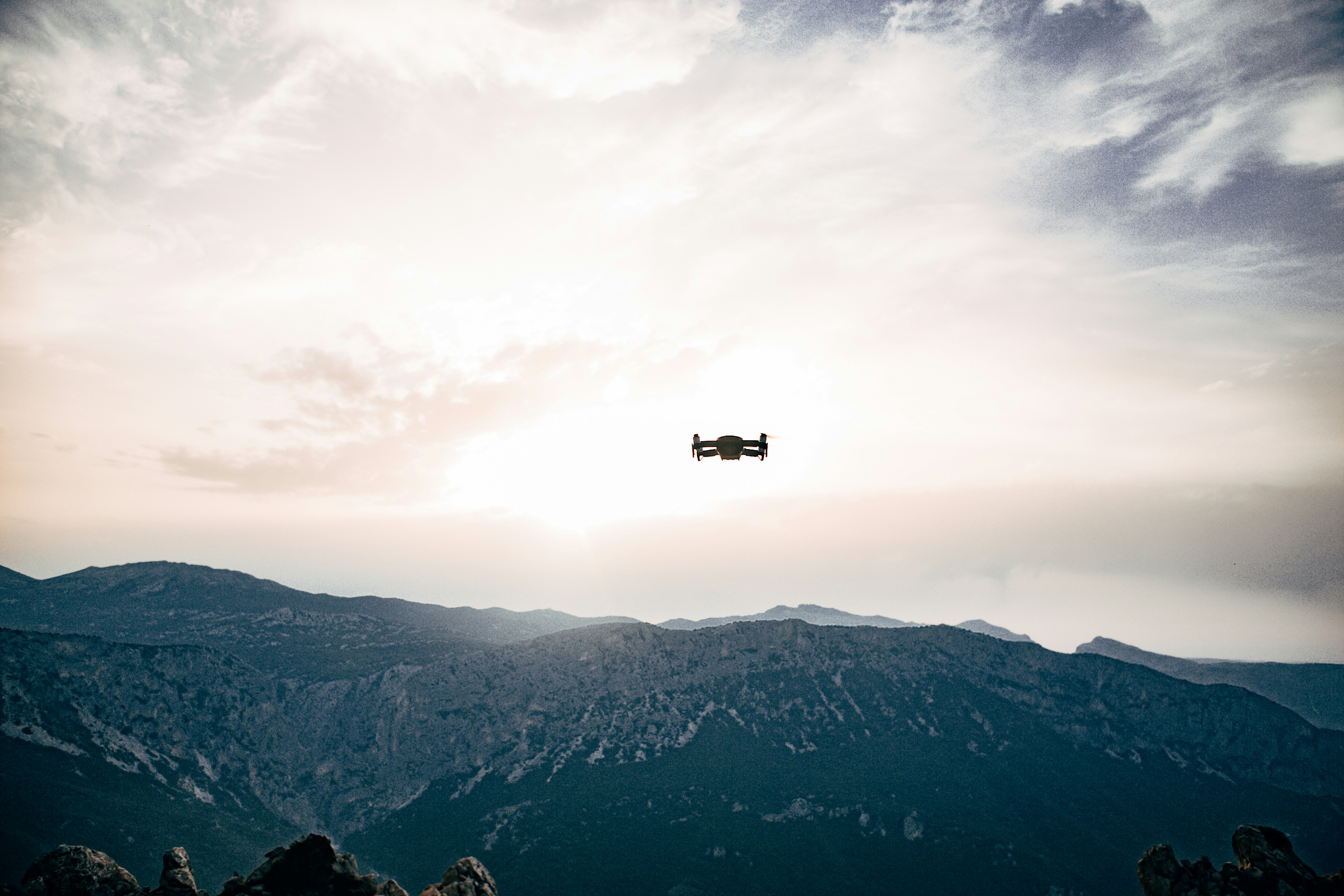 A drone in flight over the Maluti mountain ranges of Lesotho at sunset